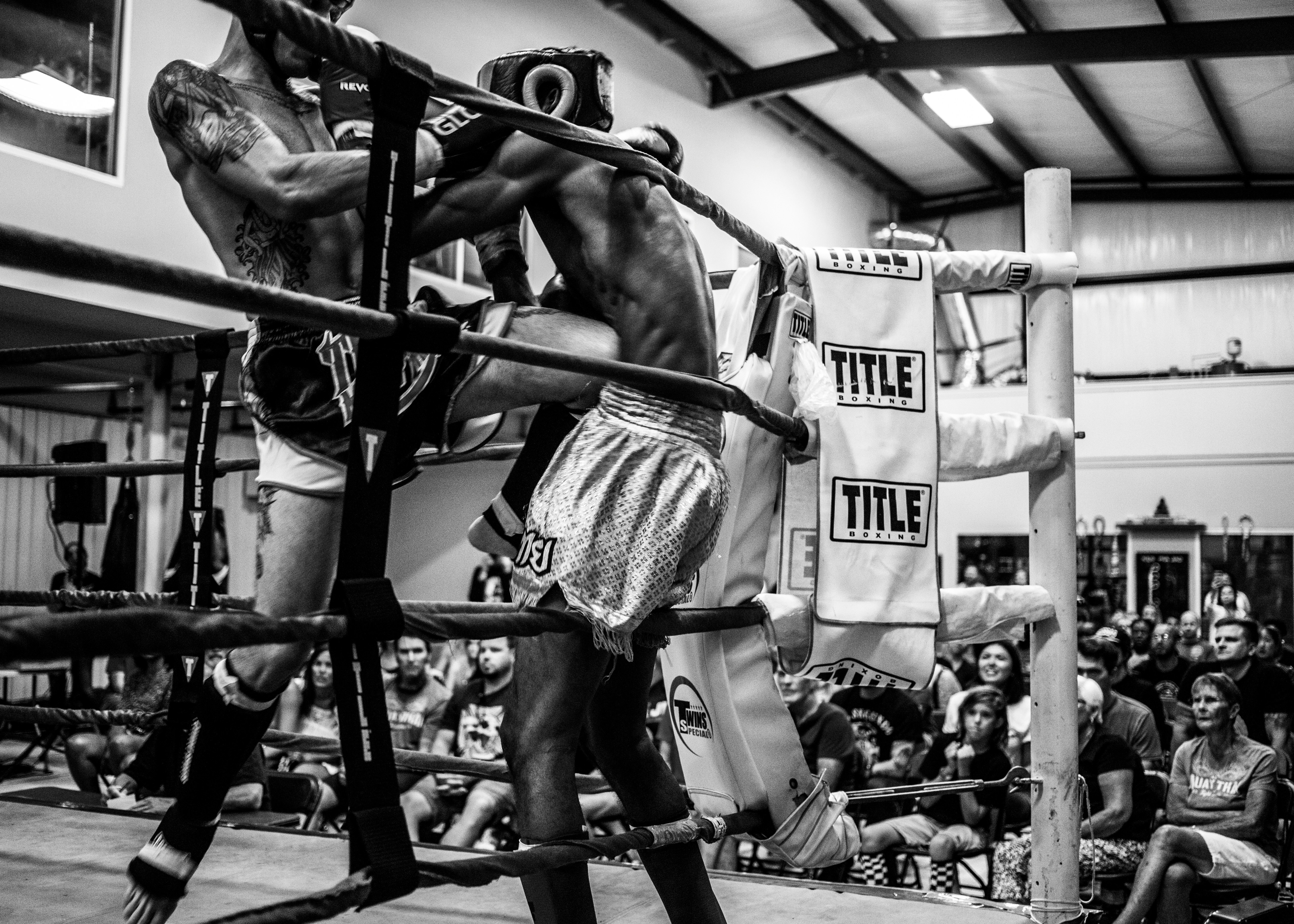 Kickboxing image in black and white. muay thai fight.